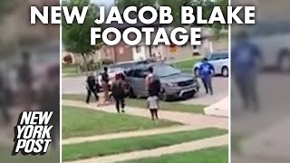 Jacob Blake seen struggling with officers before being shot, new video shows | New York Post