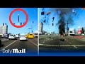 Falling missile almost obliterates cars on Kyiv road dashcam footage shows