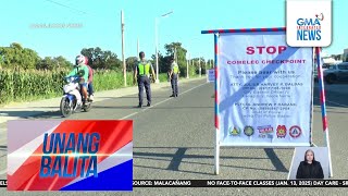 Ilang motorcycle rider na wala o unauthorized ang helmet, sinita sa Comelec... | Unang Balita