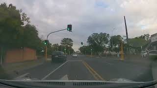 speeding BMW at school zone, white car and me going max speed limit allowed