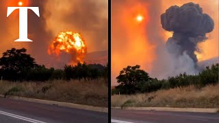 Moment Greece ammunition depot explodes amid raging wildfires