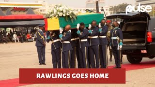 Late Jerry John Rawlings' coffin being carried to the cemetery.