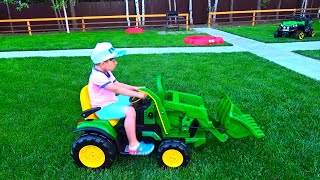 Senya drives a children's tractor