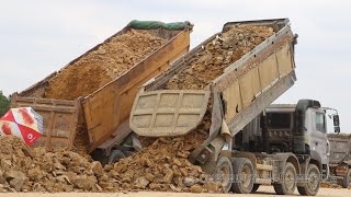 Dump truck unloading dirt - Dump truck on road - ឡានបែនចាក់ដីធ្វើផ្លូវ