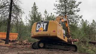 Cat 316 clearing land