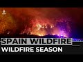 Firefighters battle more than 100 wildfires in Spain