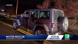 Driver rescued from flooded road in Sacramento County