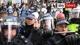 Police struggle to keep rival protesters apart as tensions rise