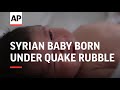 Syrian baby born under quake rubble 'doing well'