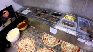 The making of pizza in Rimini, Italy