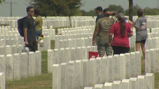 Volunteers honor heroes and remember lives lost by helping clean up headstones