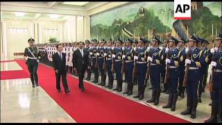 PM Gilani is welcomed by Premier Wen Jiabao; delegation