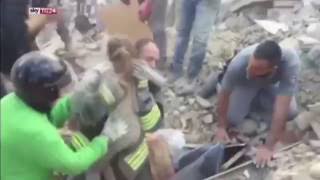 Girl rescued from rubble in Italy