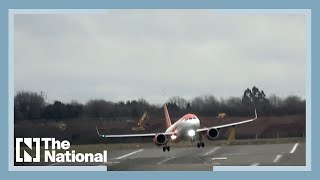 Terrifying moment plane struggles to land as Storm Dudley hits UK