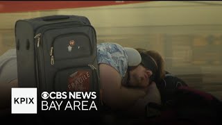 Delta passengers stranded for days following global outage