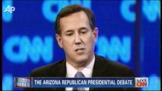 Romney, Santorum Swap Charges in 20th Debate