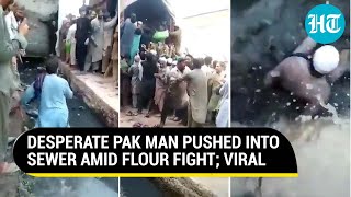 Pak Wheat Fight: Man pushes others into open drain for bag of cheap flour | Viral