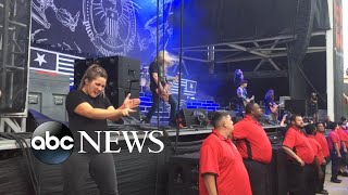 Sign language interpreter rocks out at heavy metal concert
