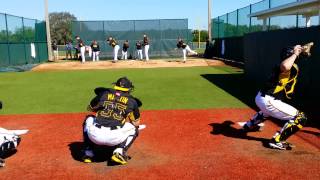 Jameson Taillon throwing to Russell Martin