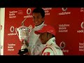 Lewis Hamilton presents Alex Albon with the 