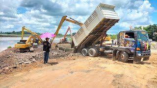 รถแบคโฮขุดหินปิดบล็อกคันอ่างเก็บร้ำลำตะโคงที่แตก ต.หัวฝาย แคนดง บุรีรัมย์