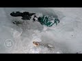 must see raw footage hero skier rescues buried snowboarder