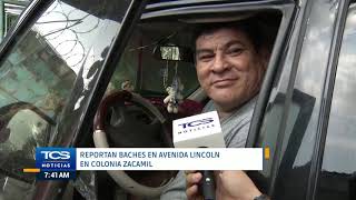 Reportan baches en avenida Lincolin en colonia Zacamil