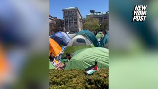 shows Columbia University students encamping on the campus quad