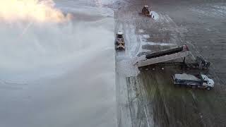 Drone view - Clyde Avenue Ottawa city snow dump January - snow removal from streets - February 2022