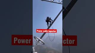 Power Cable inspector climbing high！#china #chinaconstruction #construction #chinapower #powercable