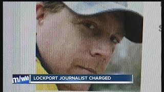 Lockport journalist charged after domestic incident