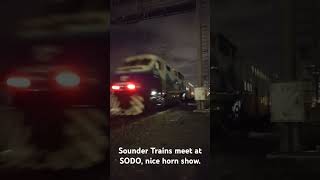 Cabs 305 and 102 and SDRX locomotives 910 and 904 meet at SoDo below bridge. Video taken Oct/21/24.