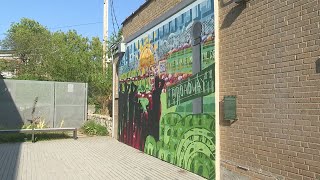 Mural works to remember hidden Kansas City neighborhood