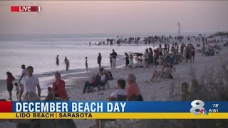 Visitors flock to Sarasota beaches to enjoy near record temperatures