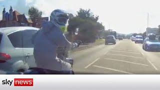 Road rage driver knocks motorcyclist off bike after 50mph chase