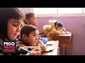 Air strike threats don't deter these Syrian children from going to school