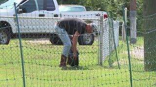 Parents outraged after man puts electric fence up next to bus stop