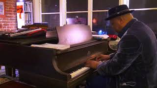 Cuban piano master Chuchito Valdes plays solo piano at Allison Lovejoy's salon.