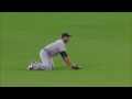 det@tor gose makes a diving grab to rob revere