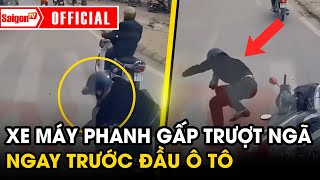 Hú hồn bạt vía xem clip xe máy phanh gấp trượt ngã ngay trước đầu ô tô suýt “bay màu” | SaigonTV