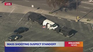 Body found inside white van possibly connected to mass shooting
