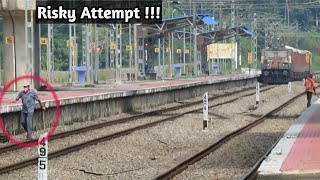 Risky attempt infront of fast running train | Shalimar Kollam parcel train skips ettumanoor station