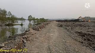 নাফ নদীর উপর নির্মিতব্য বেড়িবাঁধ এর অংশ।