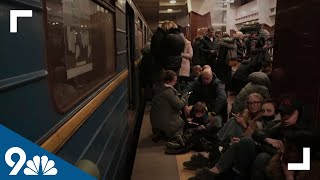 RAW: People seek shelter in subway station during attack on Ukraine