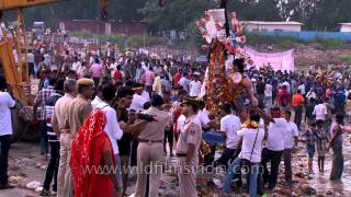 Devotees carrying the \