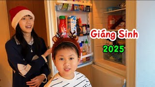 218/ The two children went into the kitchen to prepare a cozy Christmas party for their mother.