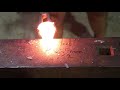 hand forging a bottom fuller hardy