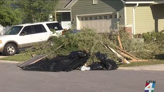 Homeowners in the TrailMark neighborhood in St. John County cleaning up after storms