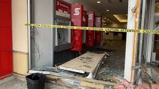 Two people injured after car smashes through an Ottawa bank