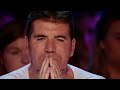 Golden Buzzer  Simon Cowell Cry When he heard the song Bed Of Roses with an extraordinary voice